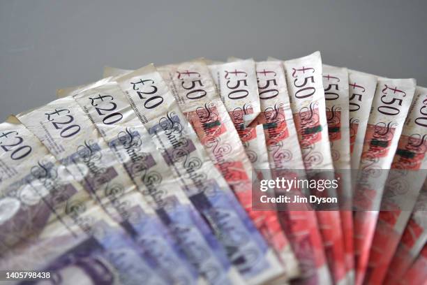 Photo illustration of the British paper £20 and £50 banknotes that will soon be taken out of circulation, June 28, 2022 in London, England. The Bank...