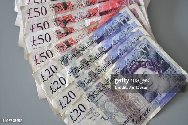 Photo illustration of the British paper £20 and £50 banknotes that will soon be taken out of circulation, June 28, 2022 in London, England. The Bank...