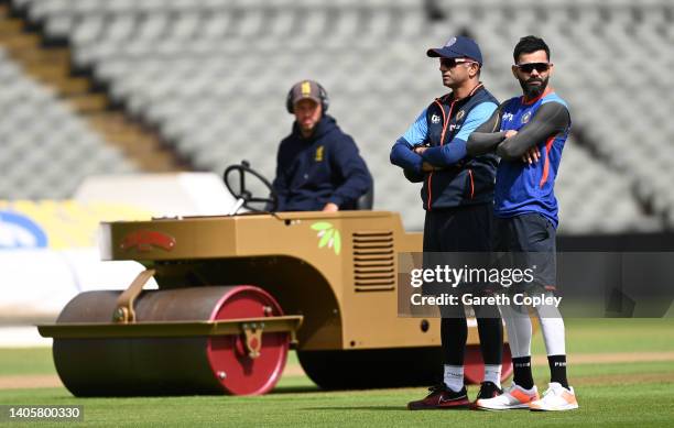 Virat Kohli of India speaks with coach Rahul Dravid during a nets session at Edgbaston on June 29, 2022 in Birmingham, England.