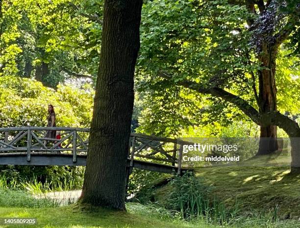 walking mother with here child - love & death stock pictures, royalty-free photos & images