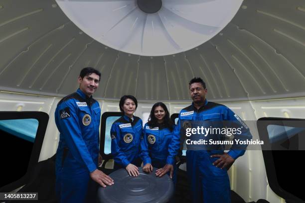 Portrait of commercial space travelers in the spaceship.