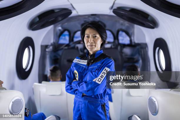 portrait of commercial space traveler, inside the spaceship. - astronaut bildbanksfoton och bilder