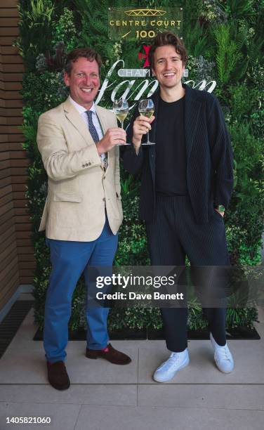 Robert Rand and Greg James with Champagne Lanson at The Championships at Wimbledon on June 29, 2022 in London, England.