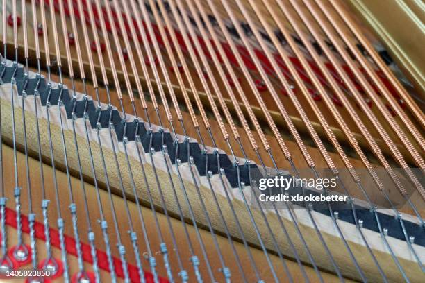 high angle view of part of piano strings - classical category stock pictures, royalty-free photos & images