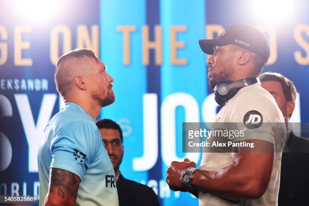 Oleksandr Usyk and Anthony Joshua face off during the Oleksandr Usyk v Anthony Joshua 2 Press Conference on June 29, 2022 in London, England.