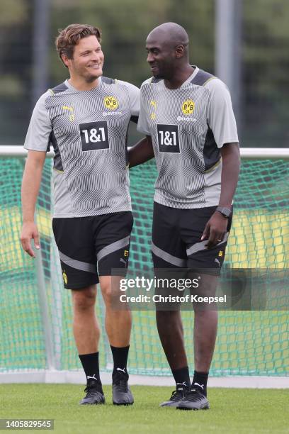Head coach Edin Terzic and Otto Addo, assistant coach attend a training session at training ground Hohenbuschei on June 29, 2022 in Dortmund,...