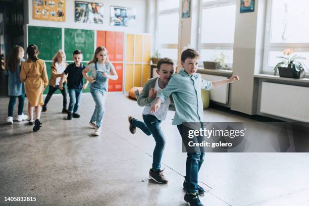 Running In The Class 345 Child Running School Hallway Stock Photos, High-Res Pictures, and ...