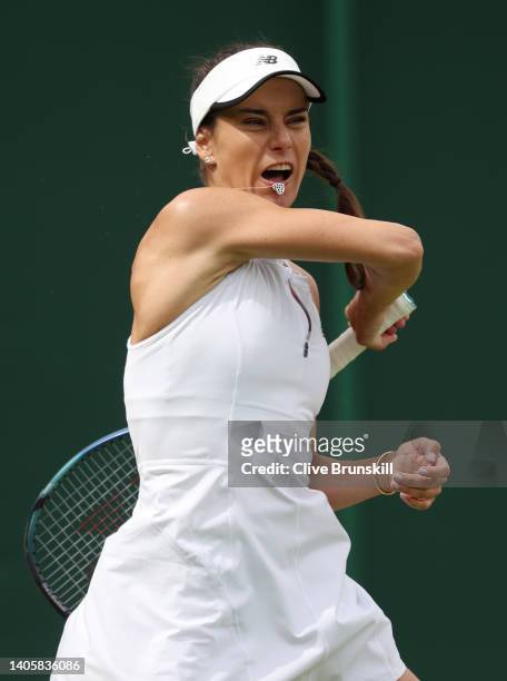 Sorana Cirstea of Romania plays a forehand against Tatjana Maria of Germany during their Women's Singles Second Round match on day three of The...