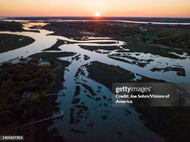 Aerial drone views of snake-like rivers and marshes in low country tidal areas of Southern Carolina.