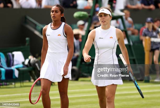 Naiktha Bains and partner Maia Lumsden of Great Britain interact during their Women's Doubles First Round match against Jasmine Paolini and Martina...