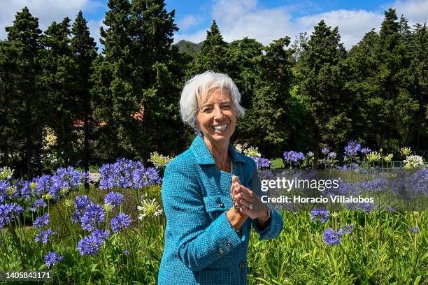 The President of the European Central Bank Christine Lagarde joins hands and smiles while bidding farewell to journalists while leaving at the end of...