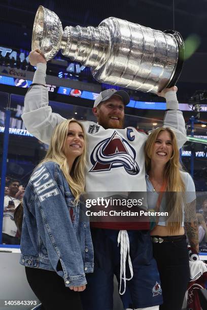 Gabriel Landeskog of the Colorado Avalanche poses with the Stanley Cup after Game Six of the 2022 NHL Stanley Cup Final at Amalie Arena on June 26,...