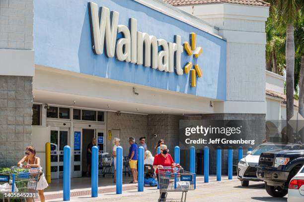 Miami, Florida, Walmart, Shoppers entering store.