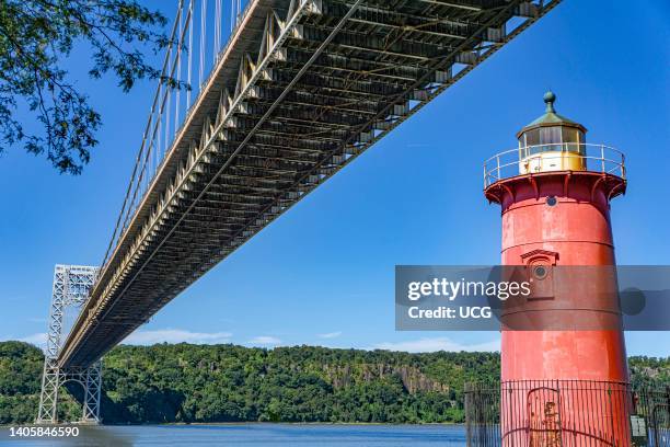 George Washington Bridge and Red Light House, Hudson River, connecting New York City, New York and Fort Lee, New Jersey in background, USA.