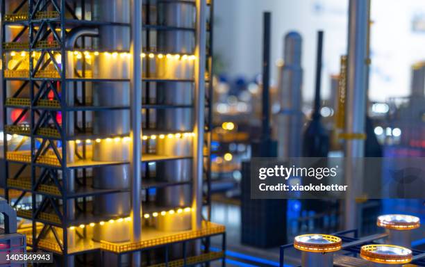 chemical plant building at night - china technology manufacturing production stock pictures, royalty-free photos & images