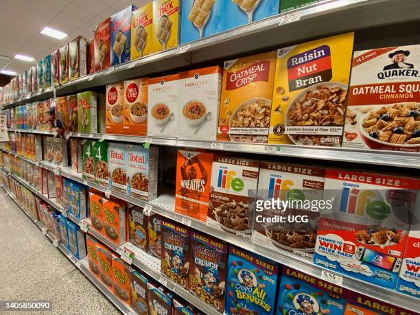 General Mills and Quaker Cereal aisle in Publix, grocery store, Florida.