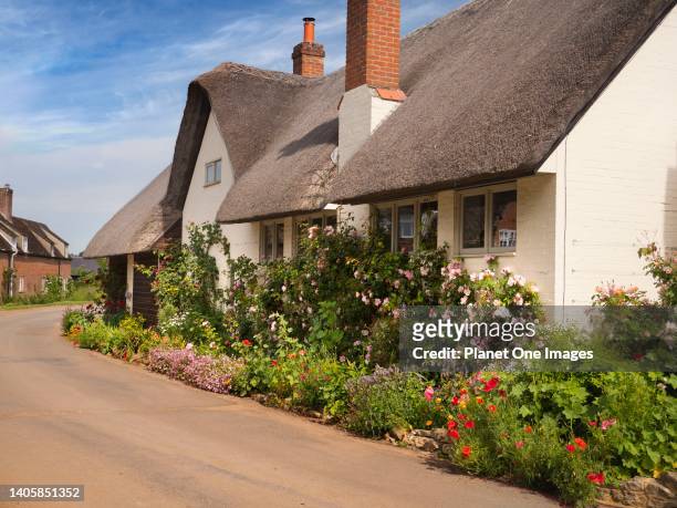 Beautiful thatched cottage in Lower Radley Village, Oxfordshire, on a fine Summer morning.