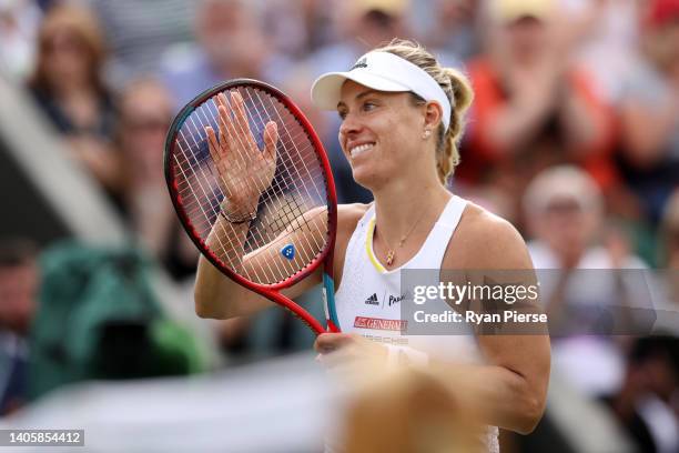 Angelique Kerber of Germany celebrates winning match point against Magda Linette of Poland during their Women's singles Second Round match on day...