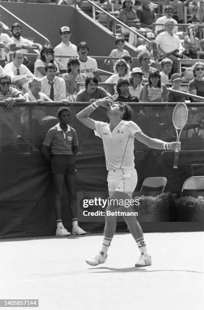 Jimmy Connors provides a light moment during his match with Thomas Hogstedt as he reacts to one of his own bad shots and shows the crow what he...