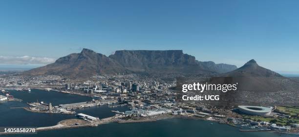 Cape Town, South Africa, Aerial view of Cape Town Harbor and Table Mountain with a blue sky. .