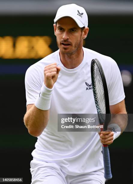 Andy Murray of Great Britain celebrates a point against John Isner of United States of America during their Men's Singles Second Round match on day...