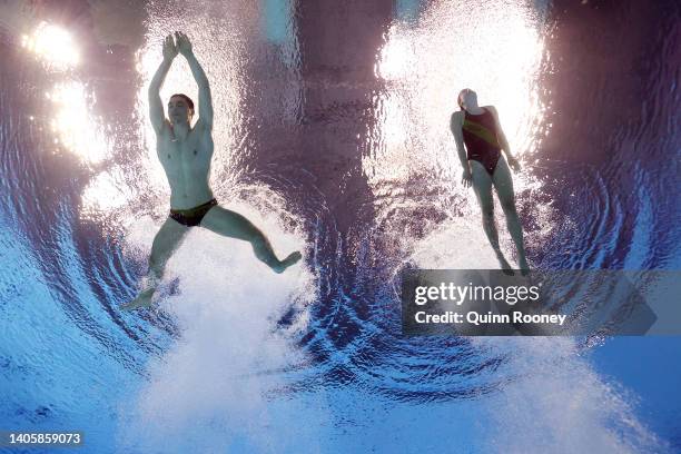 Lou Noel Guy Massenberg and Tina Punzel of Team Germany compete in the Mixed Synchronized 3m Springboard Final on day four of the Budapest 2022 FINA...