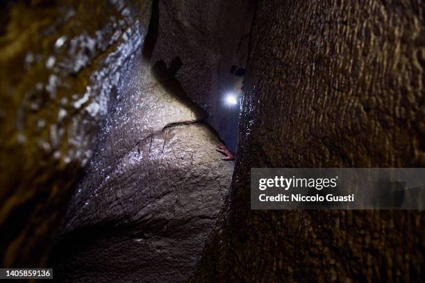 Speleologist hand is seen during a cave exploration on May 21, 2022 in Cortes de la Frontera, Spain. For the first time, Spanish speleologists and a...