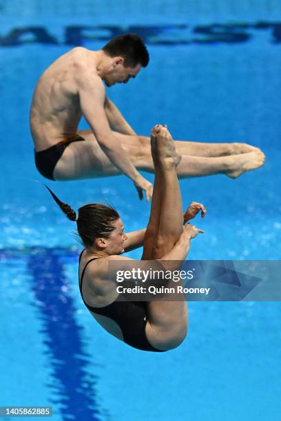 Lou Noel Guy Massenberg and Tina Punzel of Team Germany compete in the Mixed Synchronized 3m Springboard Final on day four of the Budapest 2022 FINA...