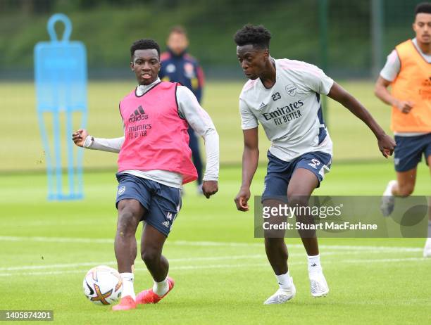 Eddie Nketiah and Sambi of Arsenal during a training session at London Colney on June 29, 2022 in St Albans, England.