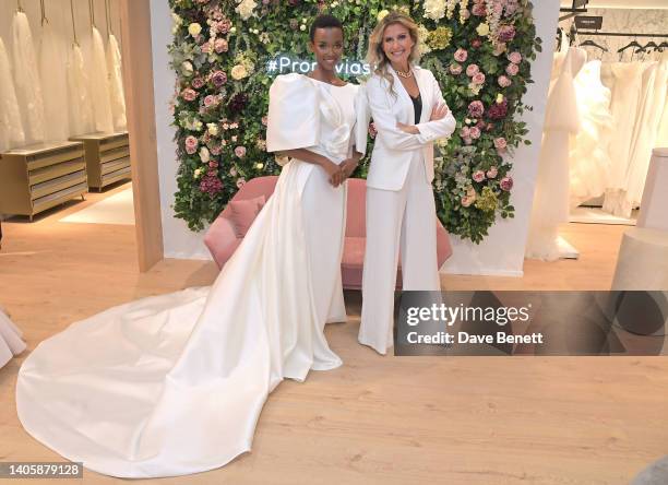 Pronovias CEO Amandine Ohayon poses with a model at the Pronovias flagship store launch on June 29, 2022 in London, England.