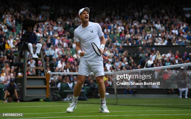 Andy Murray of Great Britain celebrates a point against John Isner of United States of America during their Men's Singles Second Round match on day...