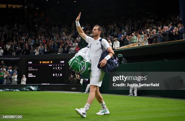 Andy Murray of Great Britain waves to the crowd after losing against John Isner of United States of America during their Men's Singles Second Round...