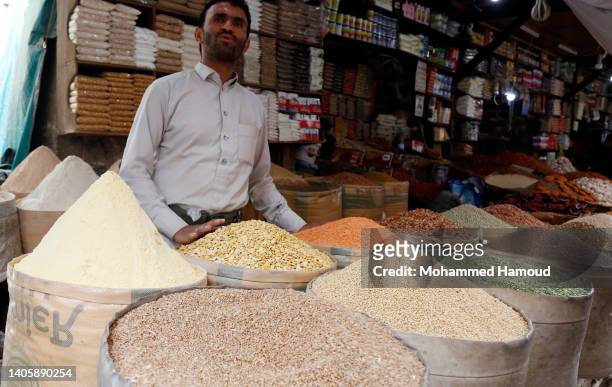 Yemenis shop for wheat at a market on June 29, 2022 in Sana'a, Yemen. In some countries of the Middle East region, like Yemen and Lebanon as a result...
