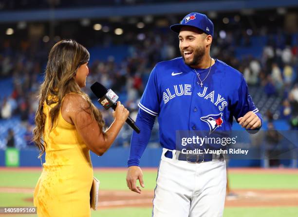 George Springer of the Toronto Blue Jays speaks to Hazel Mae of Sportsnet following a MLB game against the Boston Red Sox at Rogers Centre on June...