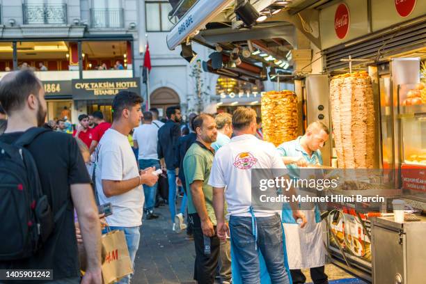 people walking on istiklal avenue in istanbul, turkey - doner kebab stock pictures, royalty-free photos & images