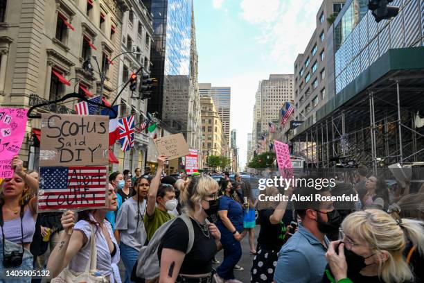 Abortion rights activists march from St. Patrick’s Cathedral to a Federalist Society event featuring former U.S. Attorney General William P....