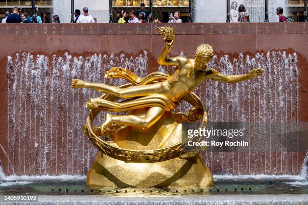 View of the "Prometheus" statue in the center of Rockefeller Plaza in front of "30 Rock" on June 29, 2022 in New York City. "30 Rock" was completed...