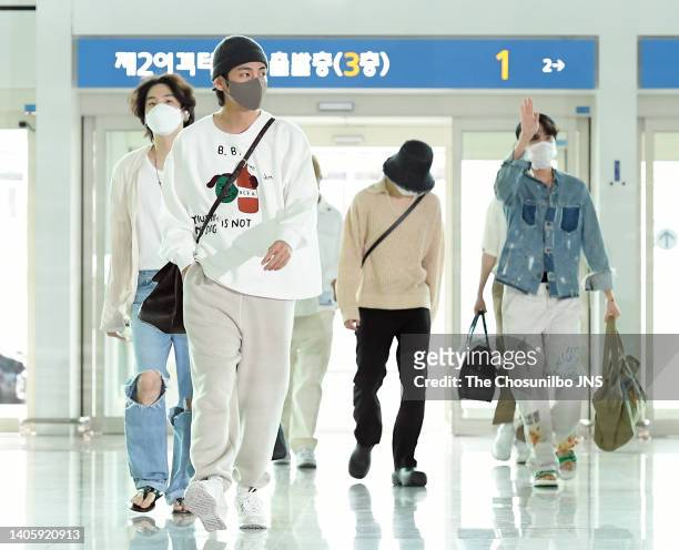 Suga, V, Jimin, J-Hope of BTS are seen leaving Incheon International Airport on May 29, 2022 in Incheon, South Korea.