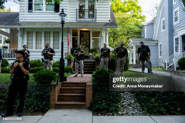 Law enforcement officers stand guard as abortion rights activists with Our Rights DC march in front of Supreme Court Justice Brett Kavanaugh's house...