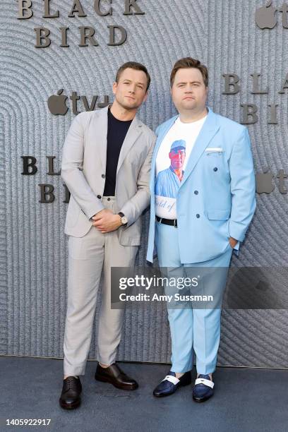 Taron Egerton and Paul Walter Hauser attend the Los Angeles premiere of Apple TV+'s new show "Black Bird" at Regency Bruin Theatre on June 29, 2022...