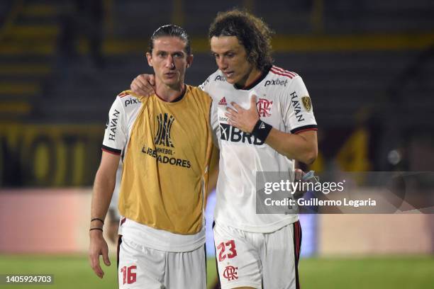 Filipe Luís and David Luiz of Flamengo talk after winning a match between Deportes Tolima and Flamengo as part of Copa CONMEBOL Libertadores 2022 at...