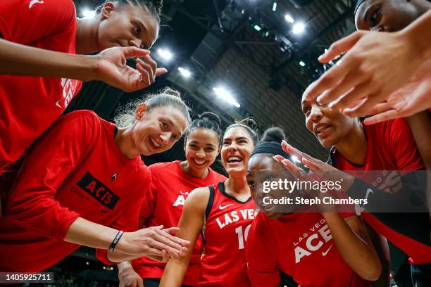 The Las Vegas Aces huddle before the game against the Seattle Storm at Climate Pledge Arena on June 29, 2022 in Seattle, Washington.