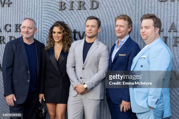Dennis Lehane, Sepideh Moafi, Taron Egerton, Greg Kinnear and Paul Walter Hauser attends the Los Angeles premiere of Apple TV+ new show 'Black Bird'...