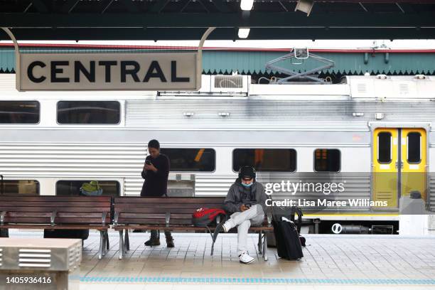 Commuters wait on a platform at Central Station on June 30, 2022 in Sydney, Australia. Sydney commuters face ongoing train delays as strike action...