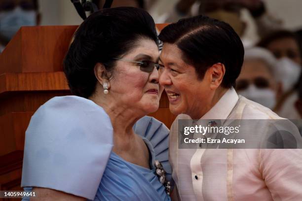 Ferdinand "Bongbong" Marcos Jr., together with his mother former First Lady Imelda Marcos, pose for pictures with their family after taking his oath...