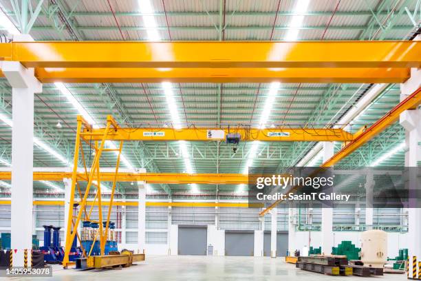 semi-gantry crane in factory - hook equipment stock pictures, royalty-free photos & images