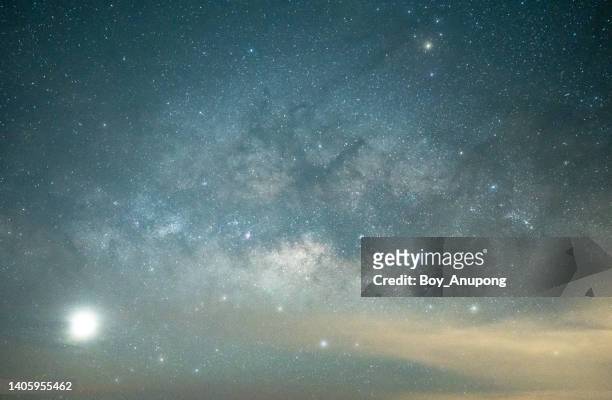 full frame shot of beautiful milky way in the starry night sky. - bright sky stock pictures, royalty-free photos & images