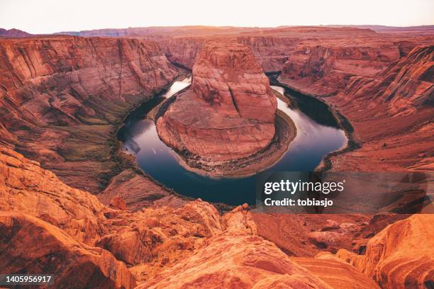 horseshoe bend at sunset - colorado river stock pictures, royalty-free photos & images