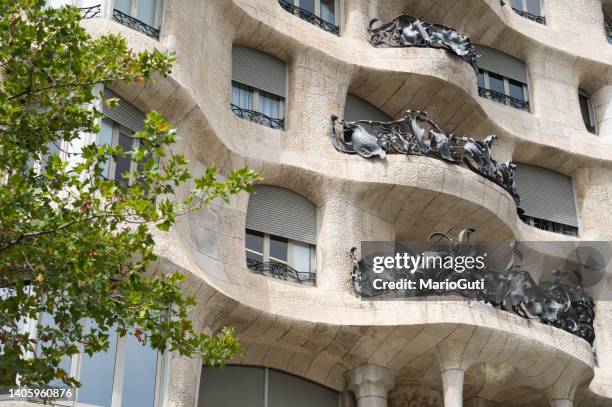 la pedrera - casa mila in barcelona - antonio gaudi stock pictures, royalty-free photos & images