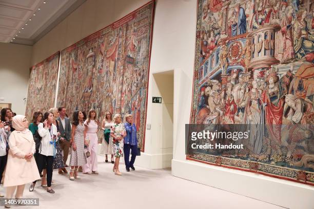 In this handout image provided by the Spanish Royal Household, Queen Letizia of Spain , and U.S. First lady Jill Biden visit an exhibition of...